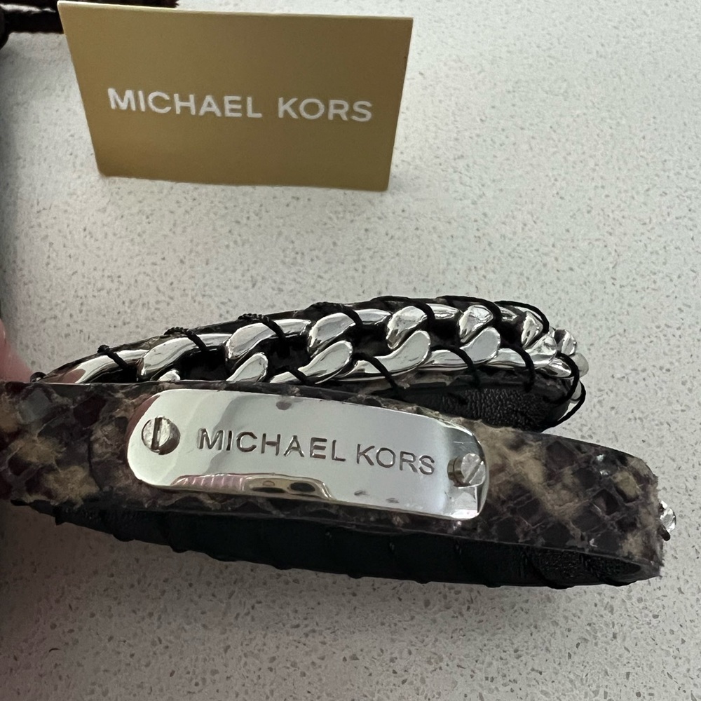 Rare authentic pre-owned Michael Kors snake print leather wrap bracelet.